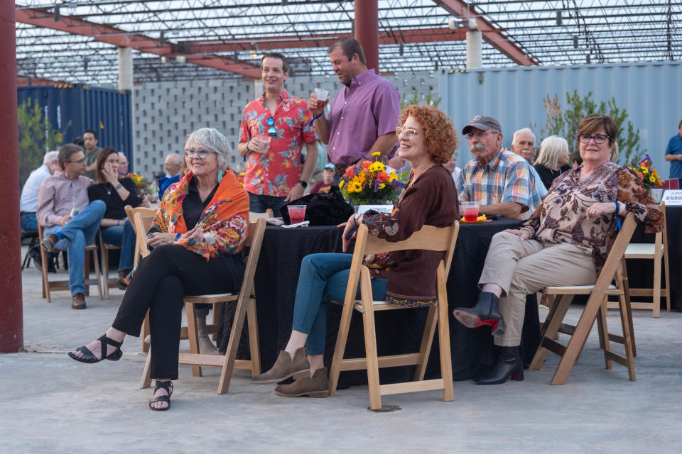 Attendees enjoy music at the new AJ Swope Performance Plaza Friday night at the Arts in the Sunset in Amarillo.