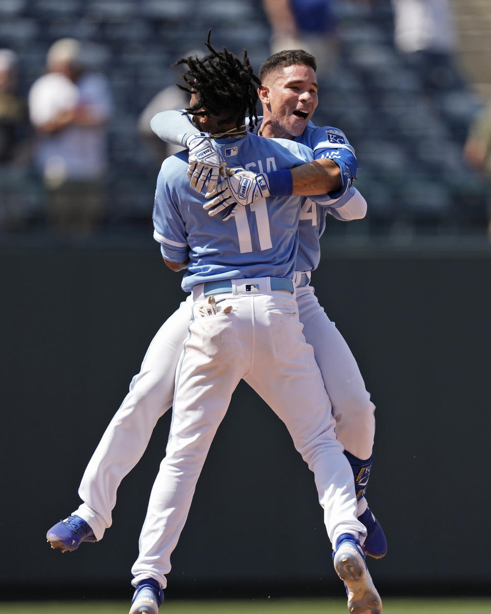 Kansas City Royals' Freddy Fermin celebrates with Maikel Garcia (11) after hitting a two-run double to win the baseball game against the Cleveland Guardians during the tenth inning Thursday, June 29, 2023, in Kansas City, Mo. The Royals won 3-2 in ten innings. (AP Photo/Charlie Riedel)