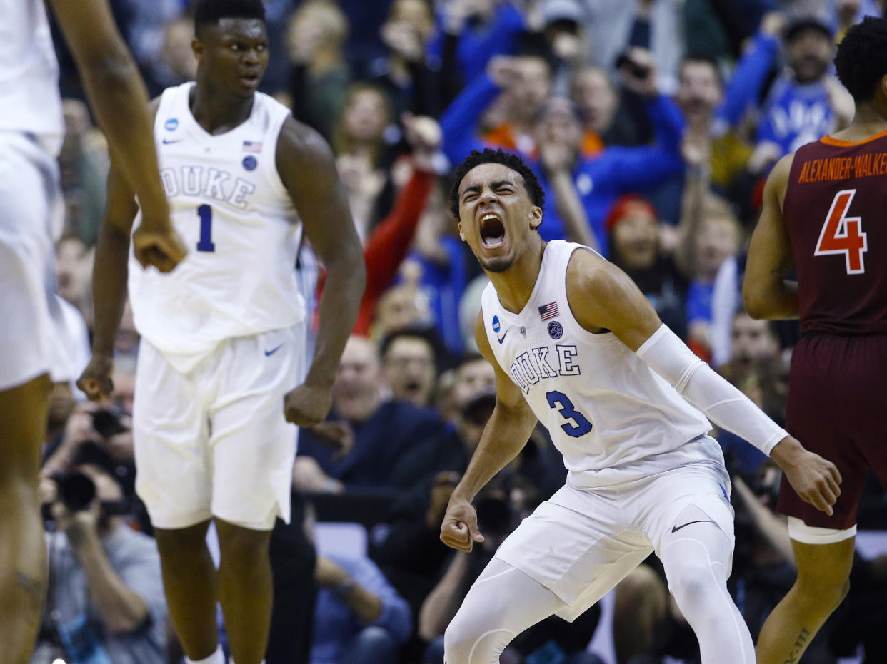 Duke guard Tre Jones (3) reacts after scoring against Virginia Tech during the second half of an NCAA men's college basketball tournament East Region semifinal in Washington, Friday, March 29, 2019. (AP Photo/Patrick Semansky)