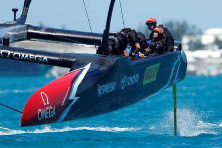 FILE PHOTO: Sailing - America's Cup finals - Hamilton, Bermuda - June 25, 2017 - Helmsman Peter Burling drives Emirates Team New Zealand to win over Oracle Team USA in race seven in America's Cup finals . REUTERS/Mike Segar/File Photo