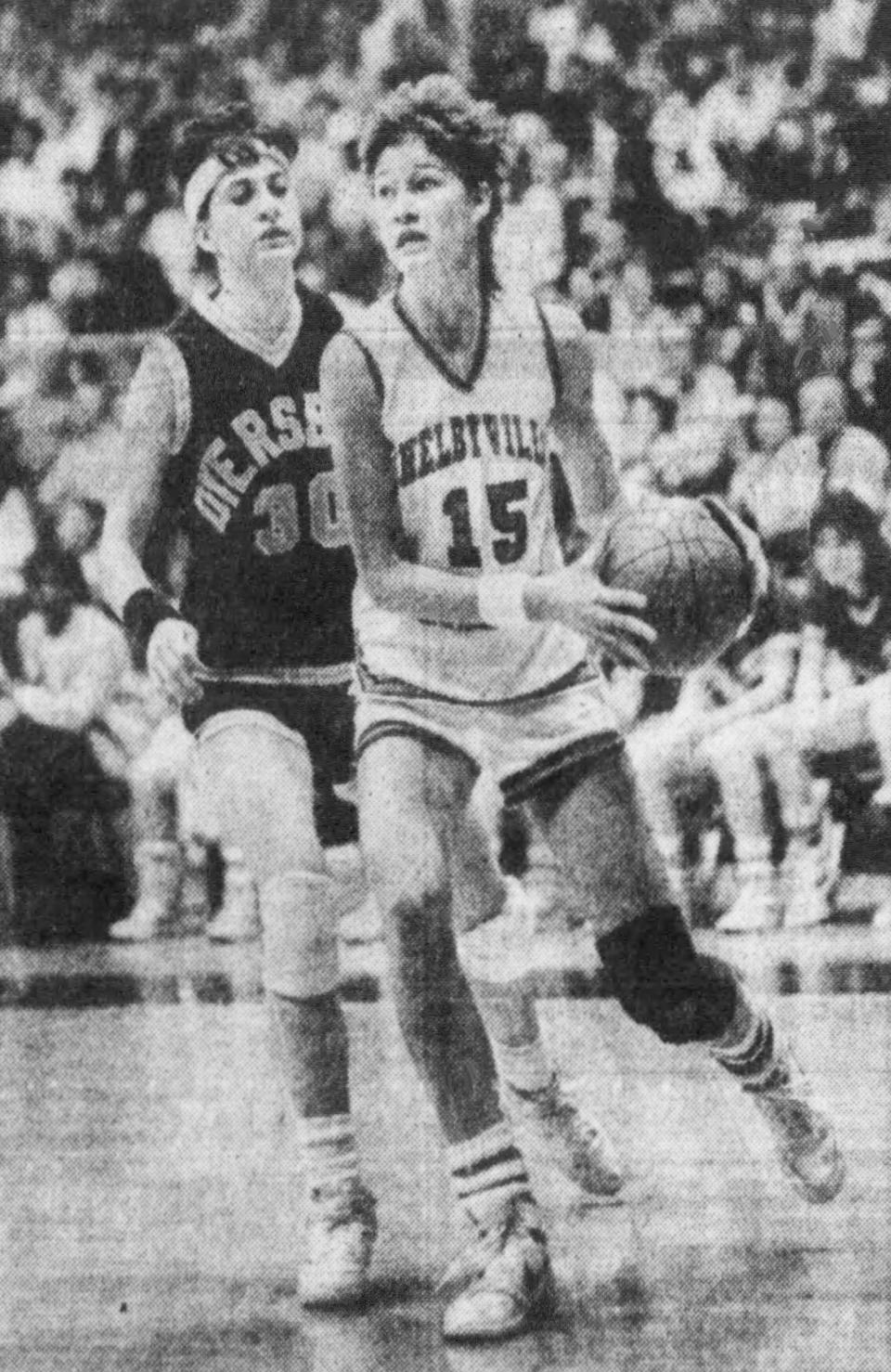 Jill Mitchell, Shelbyville High (1984-87): Here, Mitchell (15) looks for a teammate to pass the ball as Dyersburg High’s Sara Anderson (30) defends during the TSSAA Class AAA semifinals at Middle Tennessee State University’s Murphy Center in Murfreesboro on March 14, 1986.