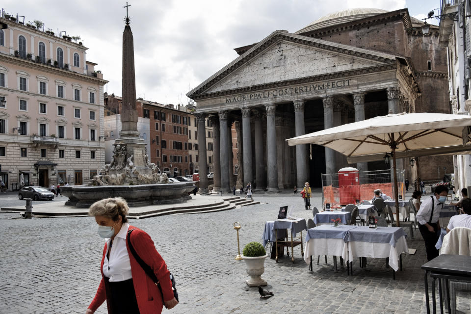 A cafe facing the Pantheon in Rome on May 20. Without tourists or office workers, many restaurants and bars remain empty. (Photo: NurPhoto via Getty Images)