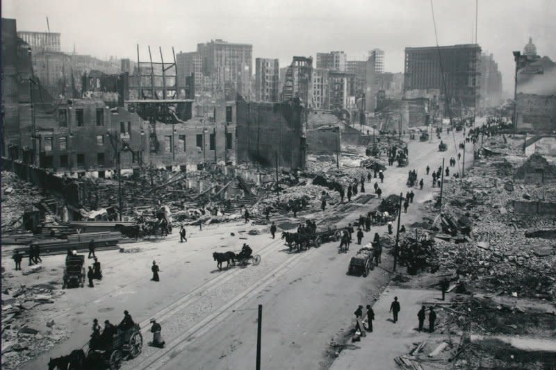 Horse-drawn vehicles make their way up Market Street after the April 18, 1906 earthquake and fire in San Francisco. File Photo courtesy the National Archives