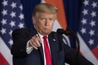 U.S.President Donald Trump points to a question during a news conference, Tuesday, Feb. 25, 2020, in New Delhi, India. (AP Photo/Alex Brandon)