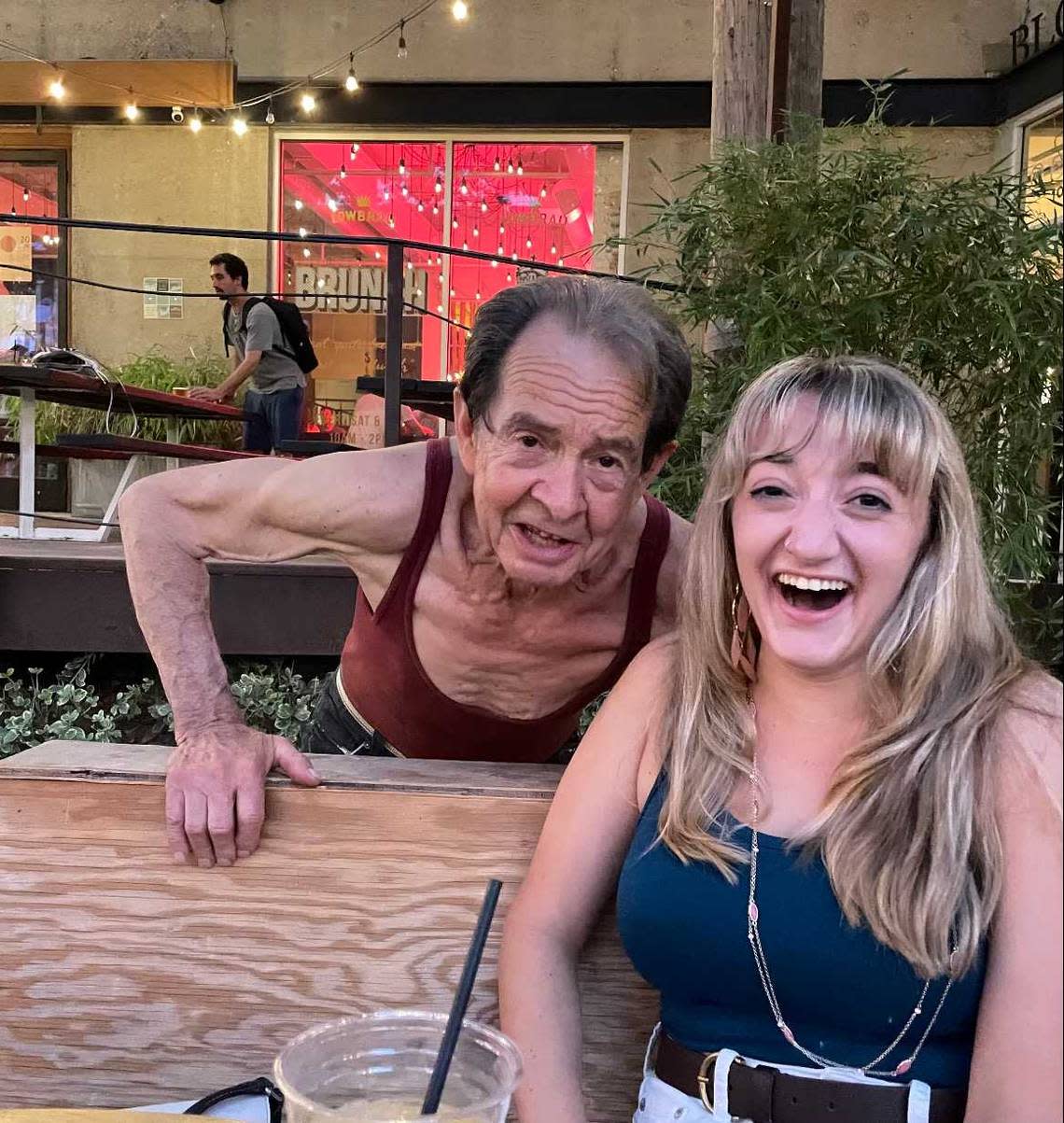 Kenny “The Dancing Man” poses with Victoria Coleman for a photo at LowBrau on Thursday, June 17, 2021.