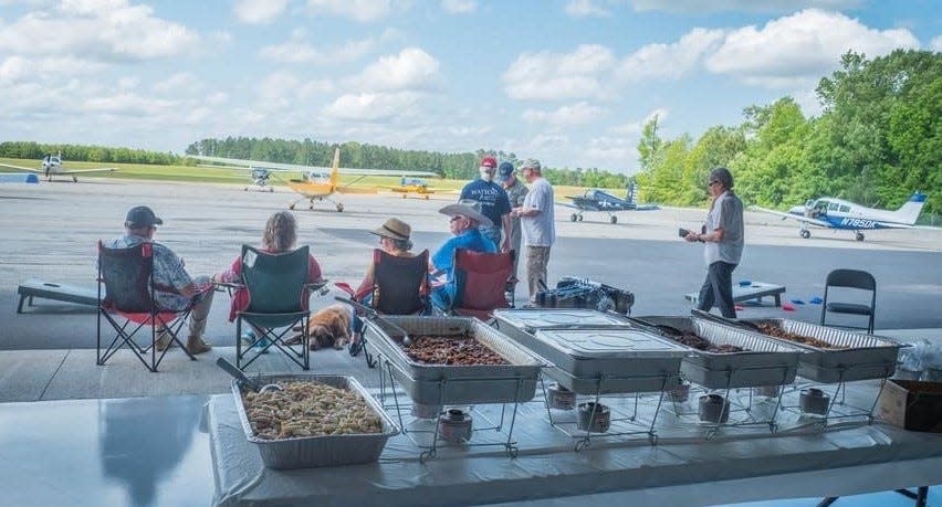 Pilots, their families and guests enjoyed a meal and conversations about flying and planes.