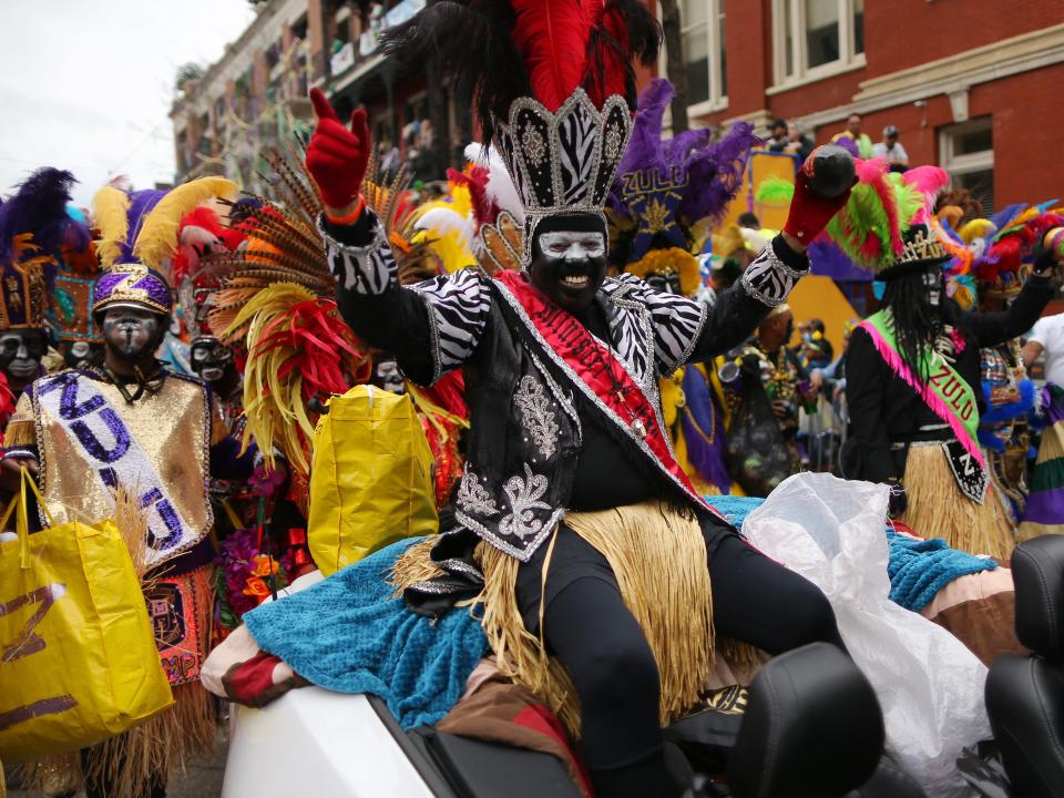 Members of the Zulu Social Aid and Pleasure Club parade down St. Charles Avenue during Fat Tuesday celebrations on February 25, 2020 in New Orleans, Louisiana.