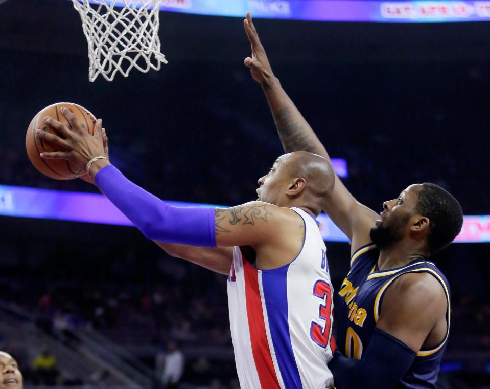 Detroit Pistons guard Caron Butler goes to the basket against the Indiana Pacers.
