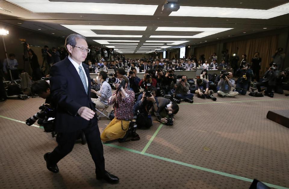 Toshiba Corp. President Satoshi Tsunakawa arrives for a press conference at the company's headquarters in Tokyo, Tuesday, Feb. 14, 2017. Japanese electronics and energy giant Toshiba said Tuesday that its chairman is resigning to take responsibility for problems that will result in a 713 billion yen ($6.3 billion) loss in its nuclear business. Toshiba warned, however, that unaudited financial results it announced may change "by a wide margin." It earlier delayed reporting its official financial results by a month, citing auditing problems related to the losses in its nuclear business. That sent Toshiba stock tumbling 8 percent in Tokyo trading. (AP Photo/Shizuo Kambayashi)