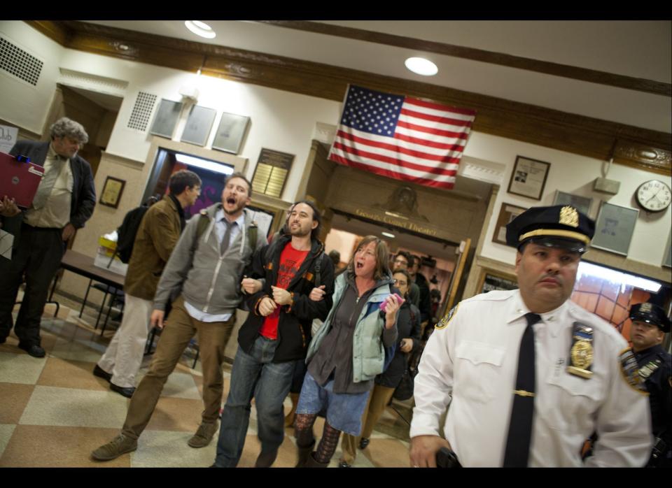 Members of Occupy Wall Street exit after occupying the Mayor's Panel for Educational Policy meeting at Seward High School, New York on Tuesday, October 26, 2011. (Myra Iqbal, AOL)