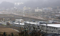 In this March 6, 2016, file photo, reconstruction process is seen at the 2011 tsunami destroyed residential neighborhood in Kesennuma, Miyagi Prefecture, northeastern Japan. (AP Photo/Eugene Hoshiko, File)