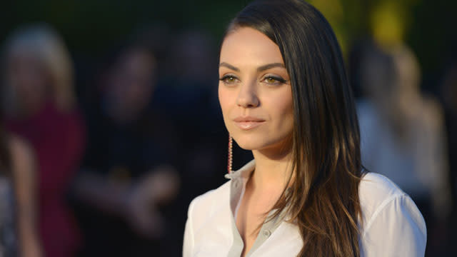 Mila Kunis and Ashton Kutcher tied the knot at the Parrish Pioneer Ranch in Oak Glen, California on Saturday, ET confirms. The couple wed in a small, intimate ceremony and security was kept tight, however ET has an exclusive first photo of a married Mila leaving the ranch on Sunday morning. Splash/ Getty Images <strong>WATCH: Ashton Kutcher and Mila Kunis Wed in Secret Ceremony! </strong> Sources tell ET that Mila left the Ranch at 10:30 a.m. and was driven to a private residence nearby, where the celebration continued. According to People, Mila and Ashton's super-secret wedding was more of a low-key celebratory party, as the couple had already gotten legally married before the event. The couple was surrounded by a small gathering of friends and family during the outdoor event. <strong>PHOTOS: Beautiful Brides: The Best Celebrity Wedding Dresses </strong> A source told People that Mila wore a white gown, as did the couple's young daughter Wyatt Isabelle. For more on Mila and Ashton's secluded wedding, check out the video below.
