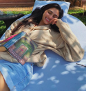 Athiya Shetty posted a picture of her enjoying her book <strong>Palace of Illusions by Chitra Banerjee Divakaruni.</strong>