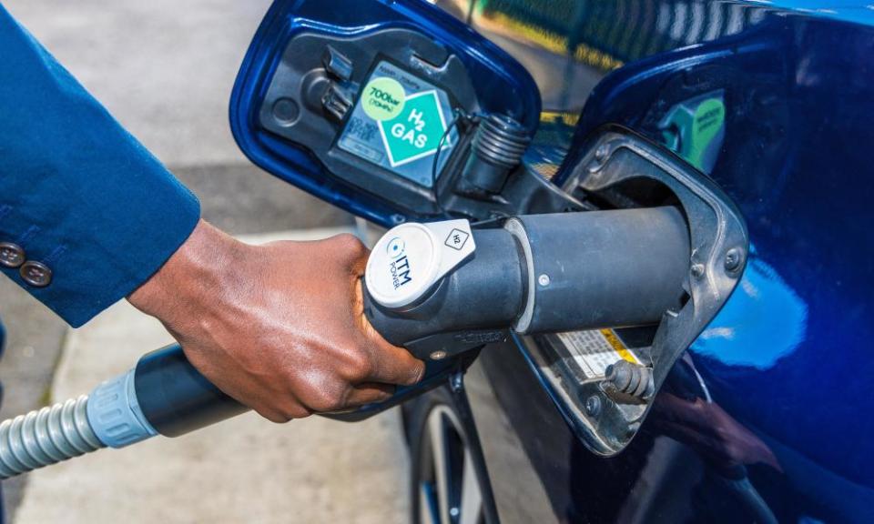 Refuelling a hydrogen car.