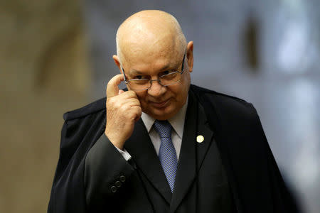 Judge Teori Zavascki arrives to attend a session at the Supreme Court in Brasilia March 11, 2015. REUTERS/Ueslei Marcelino/File photo