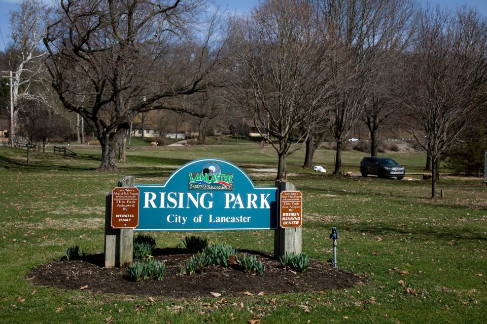A vehicle drives along the roadway in Rising Park on March 2, 2023 in Lancaster, Ohio.