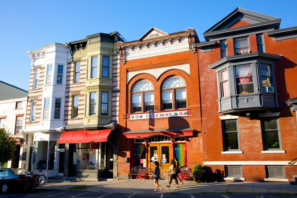 Solid red and striped brick buildings on Warren St in Hudson, New York