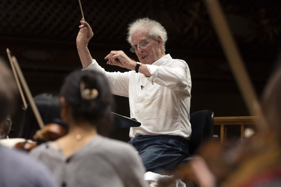 Benjamin Zander conducts the Boston Philharmonic Orchestra during a rehearsal of Beethoven's Ninth Symphony at Symphony Hall, Sunday, Feb. 19, 2023, in Boston. (AP Photo/Michael Dwyer)