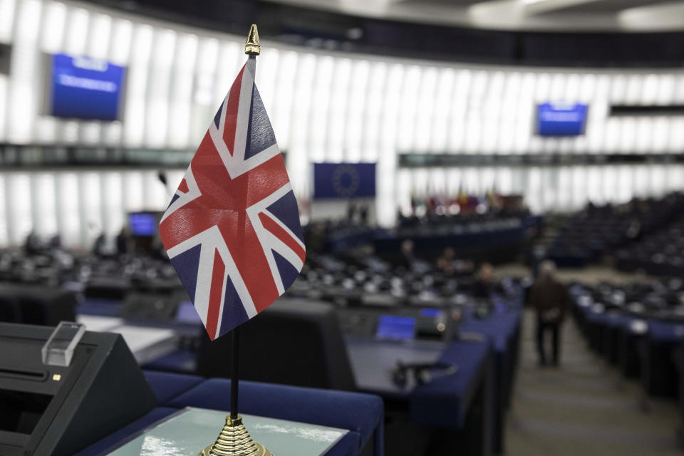 A British flag is pictured at the European Parliament during a debate on Brexit, Wednesday, Jan.16, 2019 in Strasbourg. European Union Brexit negotiator Michel Barnier says the bloc is stepping up preparations for a chaotic no-deal departure of Britain from the bloc after the rejection of the draft withdrawal deal in London left the EU "fearing more than ever that there is a risk" of a cliff-edge departure. (AP Photo/Jean-Francois Badias)