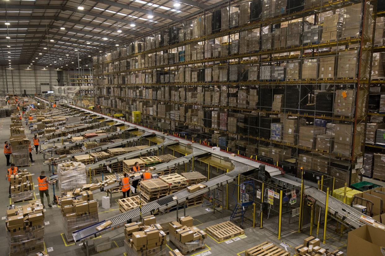 Embargoed to 2359 Wednesday November 15 Parcels are processed and prepared for dispatch at Amazon's Fulfilment Centre at Kingston Park in Peterborough as the online retailer prepares for Black Friday.