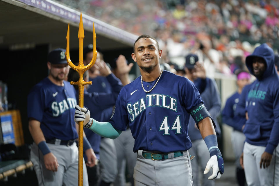 Seattle Mariners' Julio Rodriguez celebrates his two-run home run against the Detroit Tigers in the ninth inning of a baseball game, Friday, May 12, 2023, in Detroit. (AP Photo/Paul Sancya)