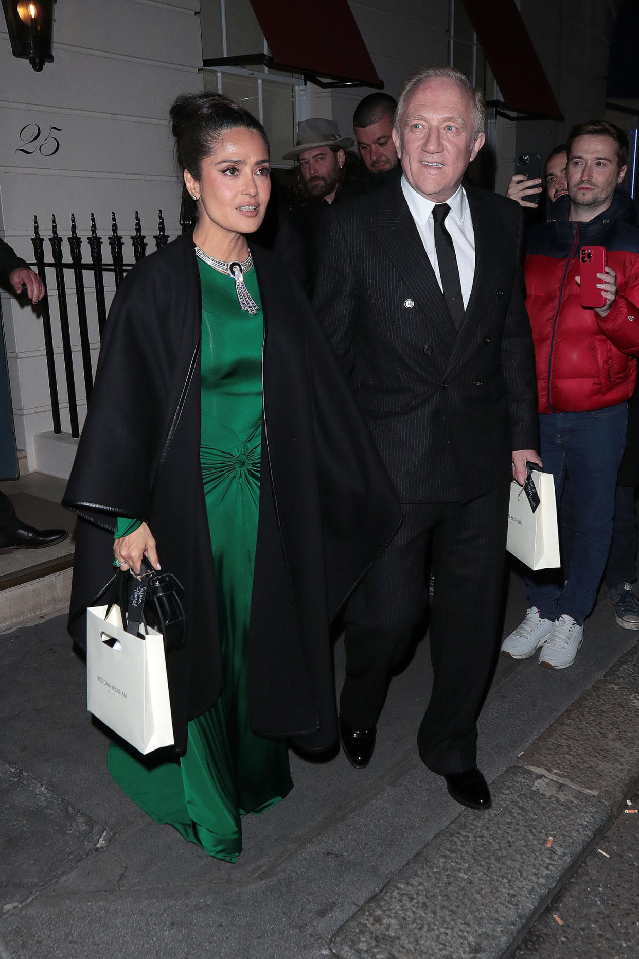 Salma Hayek and François-Henri Pinault are seen leaving Victoria Beckham - 50th birthday party at Oswald’s on April 20, 2024 in London, England. (Ricky Vigil M / Justin E Palmer / GC Images)