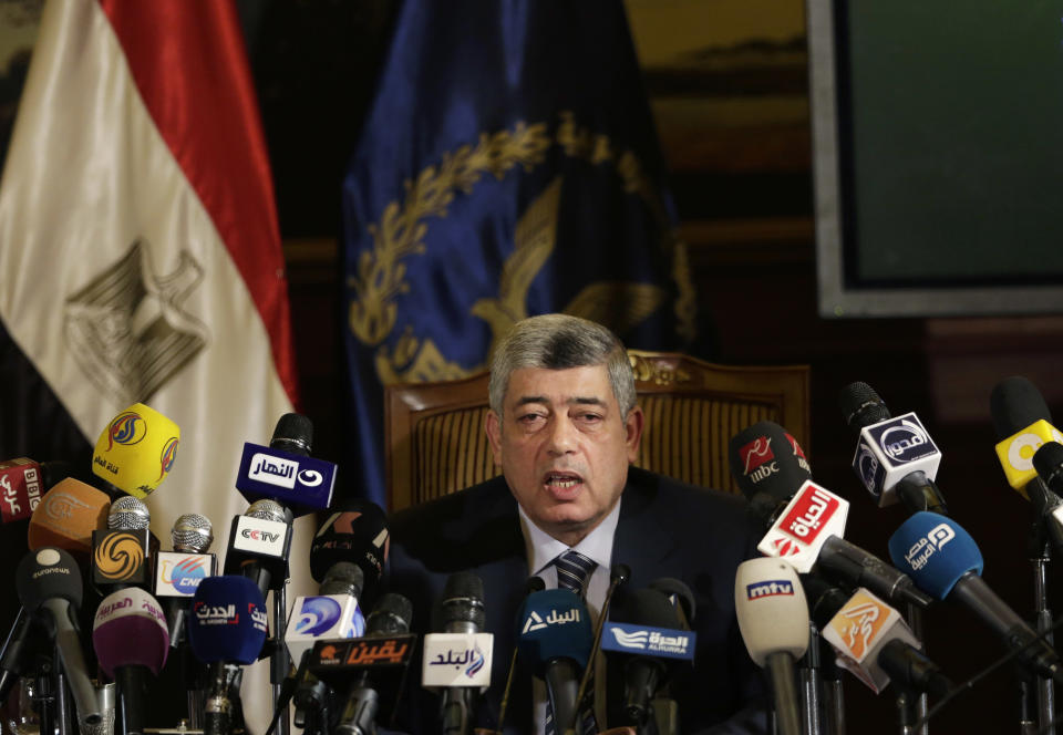 Egypt's Interior Minister Mohammed Ibrahim speaks during a press conference in Cairo, Egypt, Sunday, March 30, 2014. Ibrahim said his agents seized the documents, smuggled out of the presidential palace, before they were leaked to Qatar-based Al-Jazeera network, and the intelligence agency of an Arab country allied with the Muslim Brotherhood. (AP Photo/Hassan Ammar)