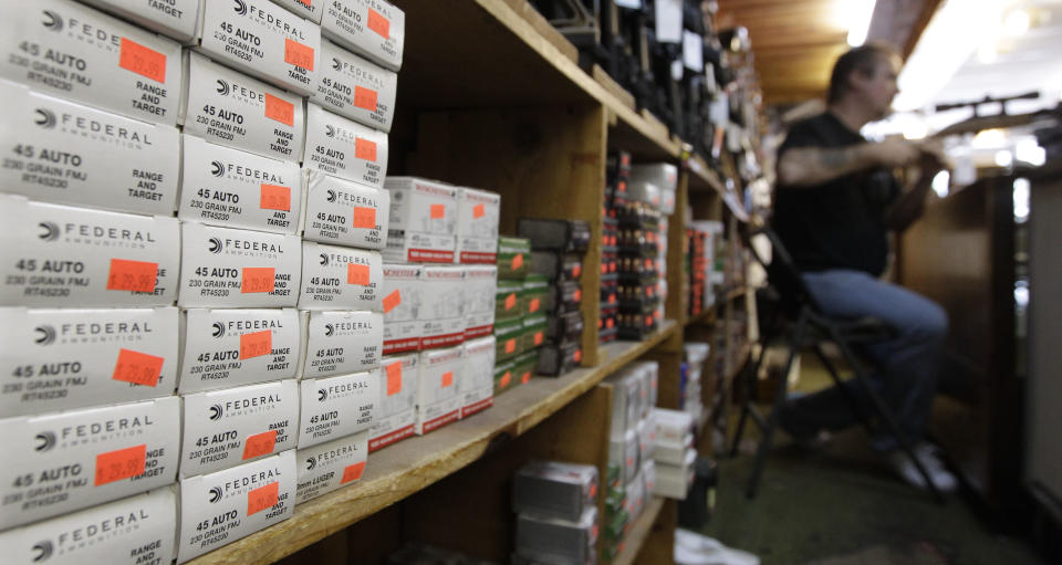 In this Wednesday, Oct. 17, 2012 photo, boxes of ammunition line the shelves of a gun shop in Tinley Park, Ill. Cook County Board President Toni Preckwinkle is set to make official her latest tax target: bullets. On Thursday Oct. 18, she will propose a tax of five cents a bullet. and a dollar for a box of 20. (AP Photo/M. Spencer Green)