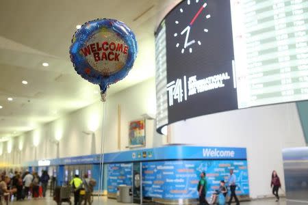 A balloon reading "Welcome Back" is seen at the arrival hall at Terminal 4 of JFK airport after U.S. President Donald Trump's limited travel ban was approved by the U.S. Supreme Court, in New York City, U.S., June 29, 2017. REUTERS/Joe Penney