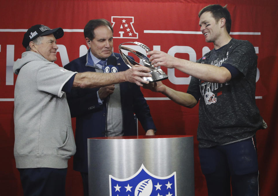 New England Patriots head coach Bill Belichick, left, and quarterback Tom Brady have something to prove this season. (AP Photo/Charlie Riedel)