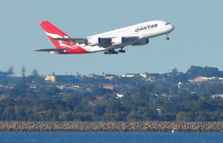 FILE PHOTO - A Qantas A380 aircraft takes off from Sydney International Airport in Australia August 22, 2017. REUTERS/Jason Reed/File Photo