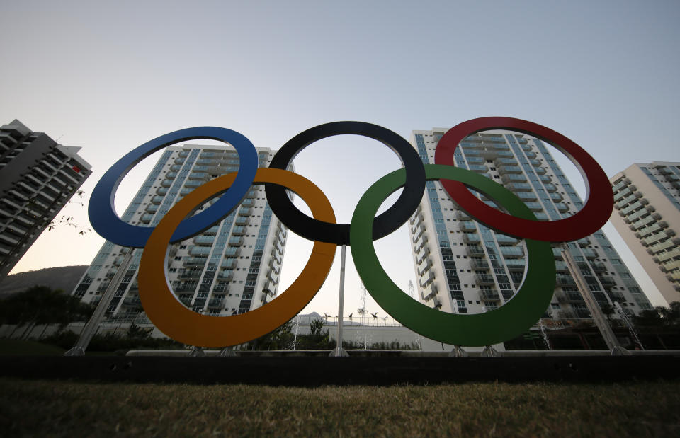  In this July 23, 2016, file photo, a representation of the Olympic rings are displayed in the Olympic Village in Rio de Janeiro, Brazil. The U.S. Olympic and Paralympic Committee will add athletes to its board and enhance its oversight of individual sports organizations. It’s part of a package of reforms stemming from the Larry Nassar sex-abuse scandal. The reforms were approved Thursday, Nov. 8, 2019 and go into effect in January. (AP Photo/Leo Correa, File)