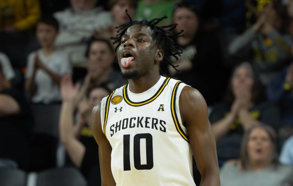 Wichita State’s Dalen Ridgnal celebrates after hitting a three-pointer during the first half against Rice on Saturday at Koch Arena.