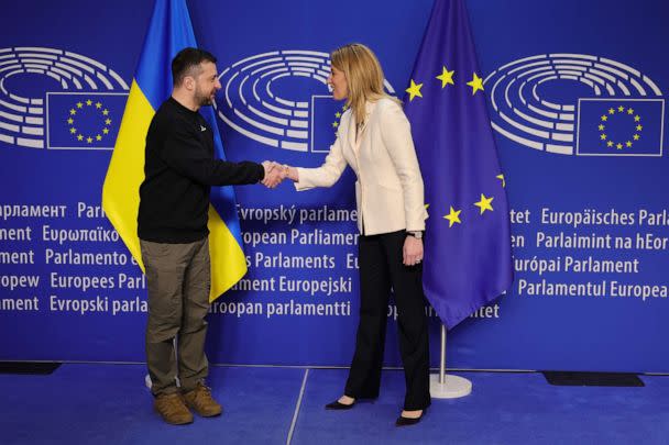 PHOTO: Ukraine's President Volodymyr Zelenskyy, left, and European Parliament's President Roberta Metsola shake hands before an EU summit at the European Parliament in Brussels, Belgium, Thursday, Feb. 9, 2023. (Olivier Matthys/AP)