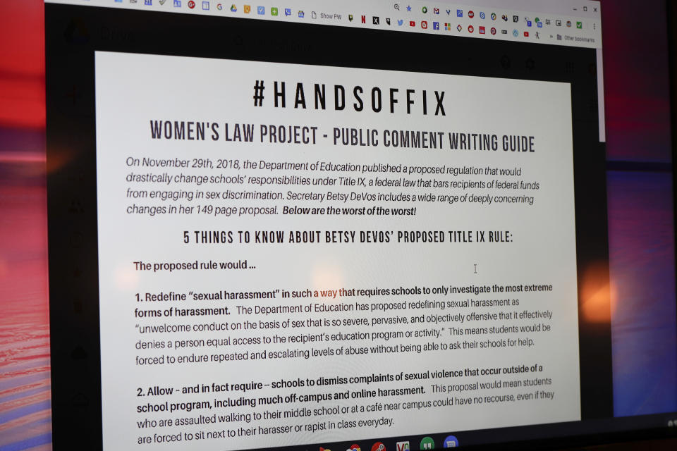 FILE - In this Jan. 23, 2019, file photo, a screen with information from the Women's Law Project shows information on some of the proposed changes to the implementation of Title IX as it pertains to the sexual abuse regulations in education at the NOW monthly meeting in Monaca, Pa. Several of the nation’s largest universities receive more sexual assault complaints from off-campus than from school property, but their obligation to address off-campus cases could be dramatically reduced under a federal proposal. (AP Photo/Keith Srakocic, File)