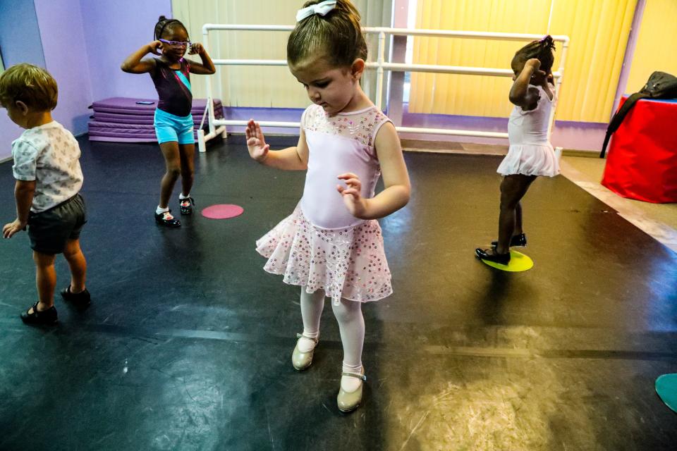 Little ones can learn ballet basics at summer camp.