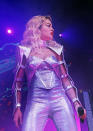 <b>Rita Ora's Emilio Pucci Radioactive tour wardrobe </b><br><br>The sleeves of Rita's silver top had buckle like panels up the sides which resembled armour.<br><br>© WENN