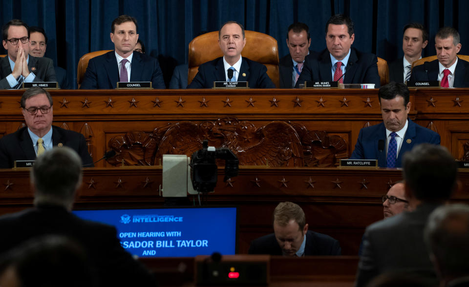 Chairman Adam Schiff (C), Democrat of California, gives an opening statement during the first public hearings held by the House Permanent Select Committee on Intelligence as part of the impeachment inquiry into U.S. President Donald Trump, with witnesses Ukrainian Ambassador William Taylor and Deputy Assistant Secretary George Kent testifying, on Capitol Hill in Washington, DC, U.S., November 13, 2019.    Saul Loeb/Pool via REUTERS