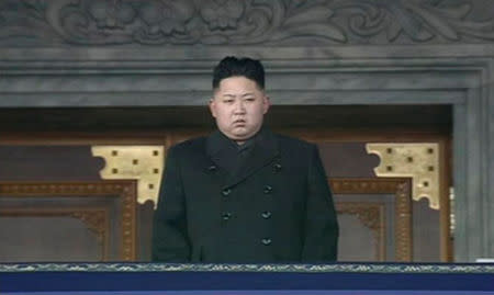 FILE PHOTO: North Korea's new leader Kim Jong-un looks on during the memorial for late North Korean leader Kim Jong-il in Pyongyang, in this still image taken from video December 29, 2011. KRT via Reuters TV/File Photo