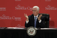 Vice President Mike Pence gestures as he participates in a roundtable discussion with hospitality and tourism industry leaders to discuss their plans for re-opening during the coronavirus outbreak Wednesday, May 20, 2020, in Orlando, Fla. (AP Photo/Chris O'Meara)