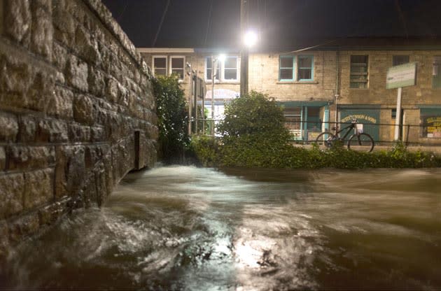 �Homes in Devon and Cornwall have flooded after torrential rain overnight. One house has partially collapsed following a landslip (Alex Atack/Rex Features)