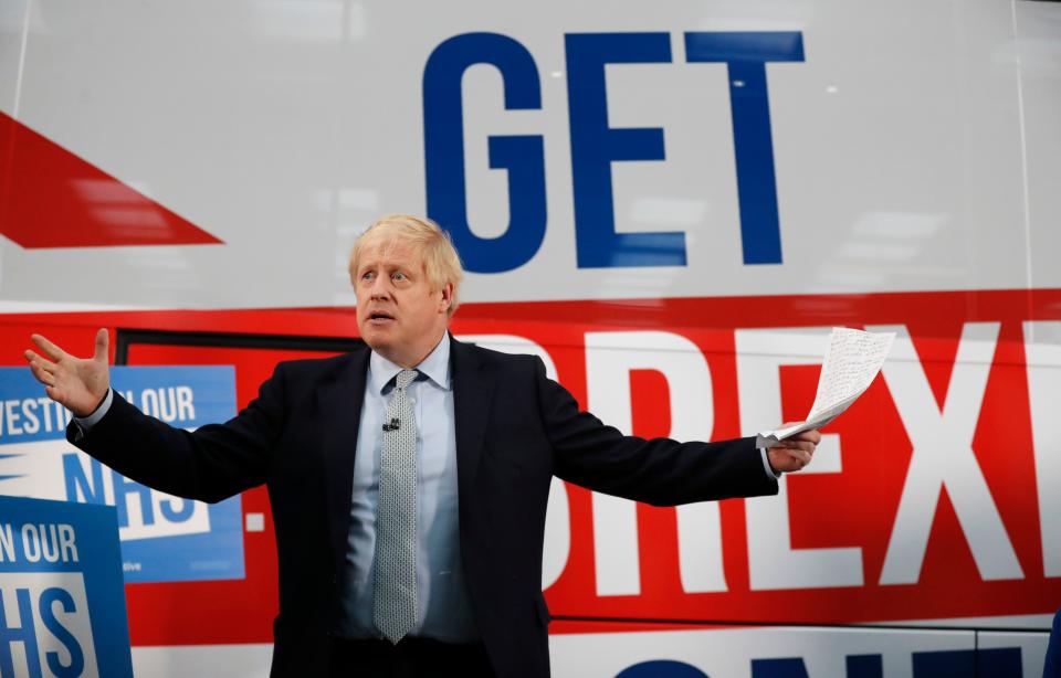 Britain's Prime Minister Boris Johnson addresses supporters as he unveils the Conservative party General Election campaign bus in Manchester, northwest England on November 15, 2019. (Photo by Frank Augstein / POOL / AFP) (Photo by FRANK AUGSTEIN/POOL/AFP via Getty Images)