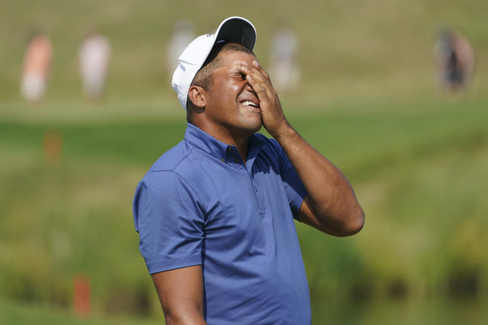 Jhonattan Vegas reacts after missing a putt on the 16th hole during the final round of the 3M Open golf tournament in Blaine, Minn., Sunday, July 25, 2021. (AP Photo/Craig Lassig)