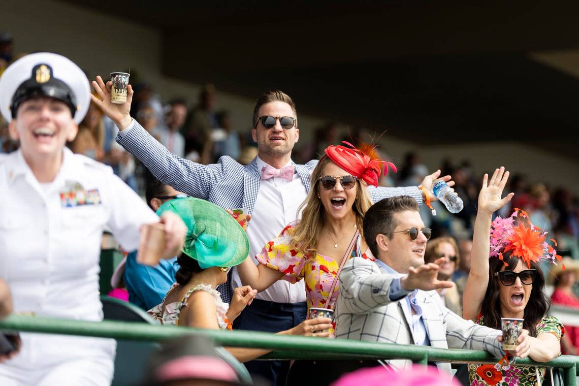 Fans gather in the stands and cheer on undercard races on Derby Day before the 149th running of the Kentucky Derby at Churchill Downs in Louisville, Ky., Saturday, May 6, 2023.