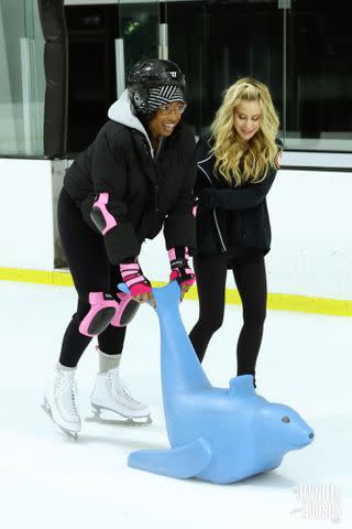 <p>Chris Millard/Warner Bros.</p> Tara Lipinski helps Jennifer Hudson on the ice