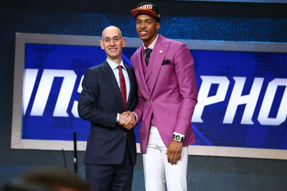 <p>BROOKLYN, NY – JUNE 23: Skal Labissiere shakes hands with NBA Commissioner Adam Silver after being selected 28th overall by the Phoenix Suns during the 2016 NBA Draft on June 23, 2015 at Barclays Center in Brooklyn, New York. (Photo by Nathaniel S. Butler /NBAE via Getty Images) </p>