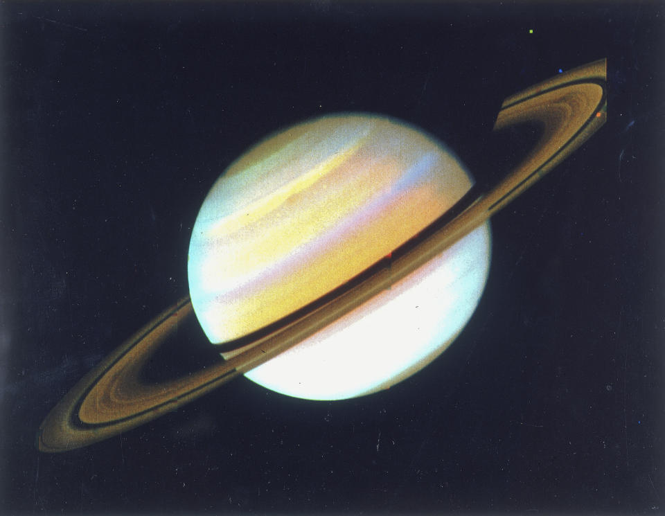 Colour-enhanced view of Saturn, 1980. Taken from the Voyager 2 spacecraft. The enhancement brings out the details in the cloud bands. Two Voyager spacecraft were launched in 1977 to explore the planets in the outer solar system. Voyager 1 made its closest approach to Jupiter of 278,000 kilometres in March 1979 before flying on to Saturn which it reached in November 1980. (Photo by Oxford Science Archive/Print Collector/Getty Images)
