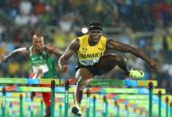2016 Rio Olympics - Athletics - Preliminary - Men's 110m Hurdles Round 1 - Olympic Stadium - Rio de Janeiro, Brazil - 15/08/2016. Omar McLeod (JAM) of Jamaica competes. REUTERS/Lucy Nicholson