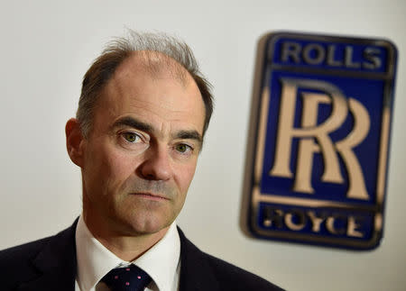 FILE PHOTO: Warren East, CEO of Rolls-Royce, poses for a portrait at the company aerospace engineering and development site in Bristol, Britain December 17, 2015. REUTERS/Toby Melville/File Photo