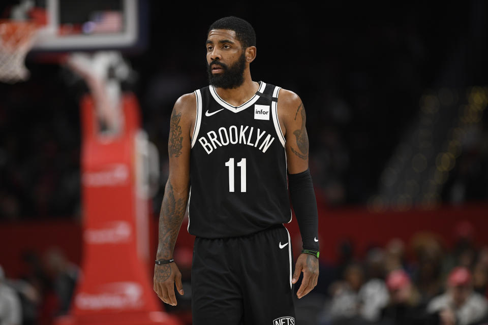 Brooklyn Nets guard Kyrie Irving (11) looks on during the second half of an NBA basketball game against the Washington Wizards, Saturday, Feb. 1, 2020, in Washington. The Wizards won 113-107. (AP Photo/Nick Wass)